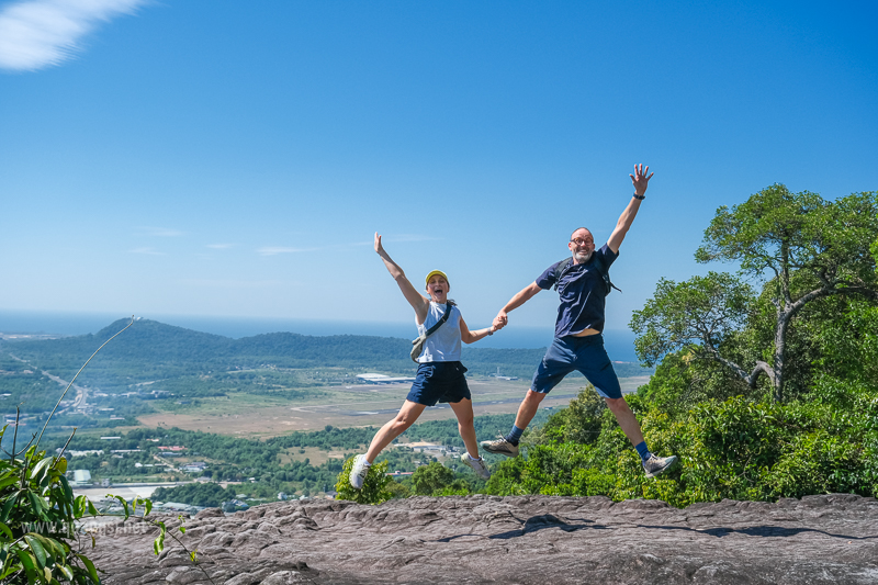 a man and woman jumping in the air